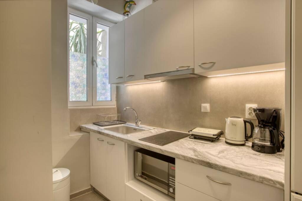 Plaka Filotheis House A Apartment Athena Bagian luar foto